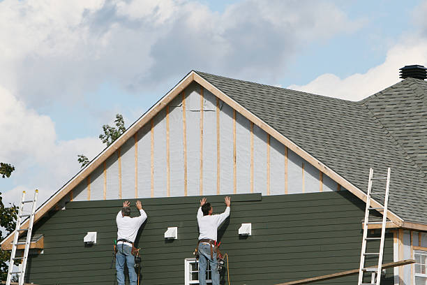Professional Storm Damage Siding Repair technician working in Milton, NC
